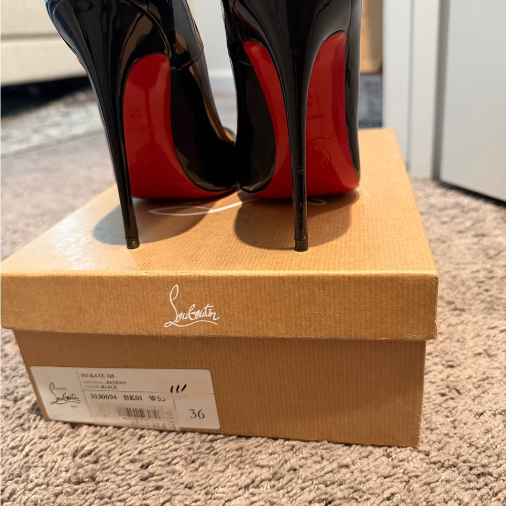 Christian Louboutin Black Patent Pumps with Signature Red Sole